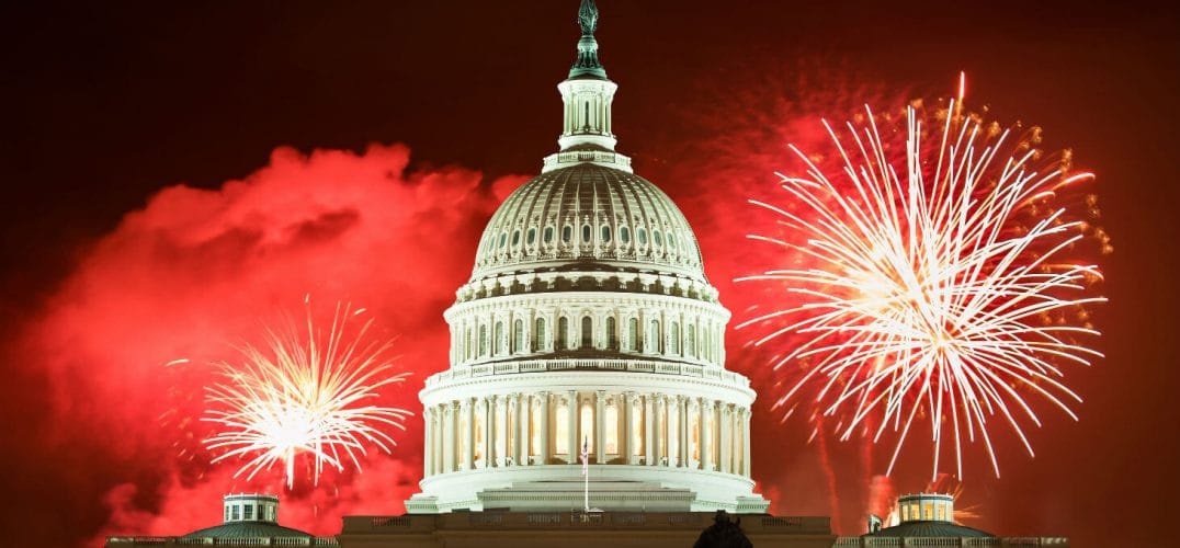 Red fireworks going off over U.S. Capitol Building