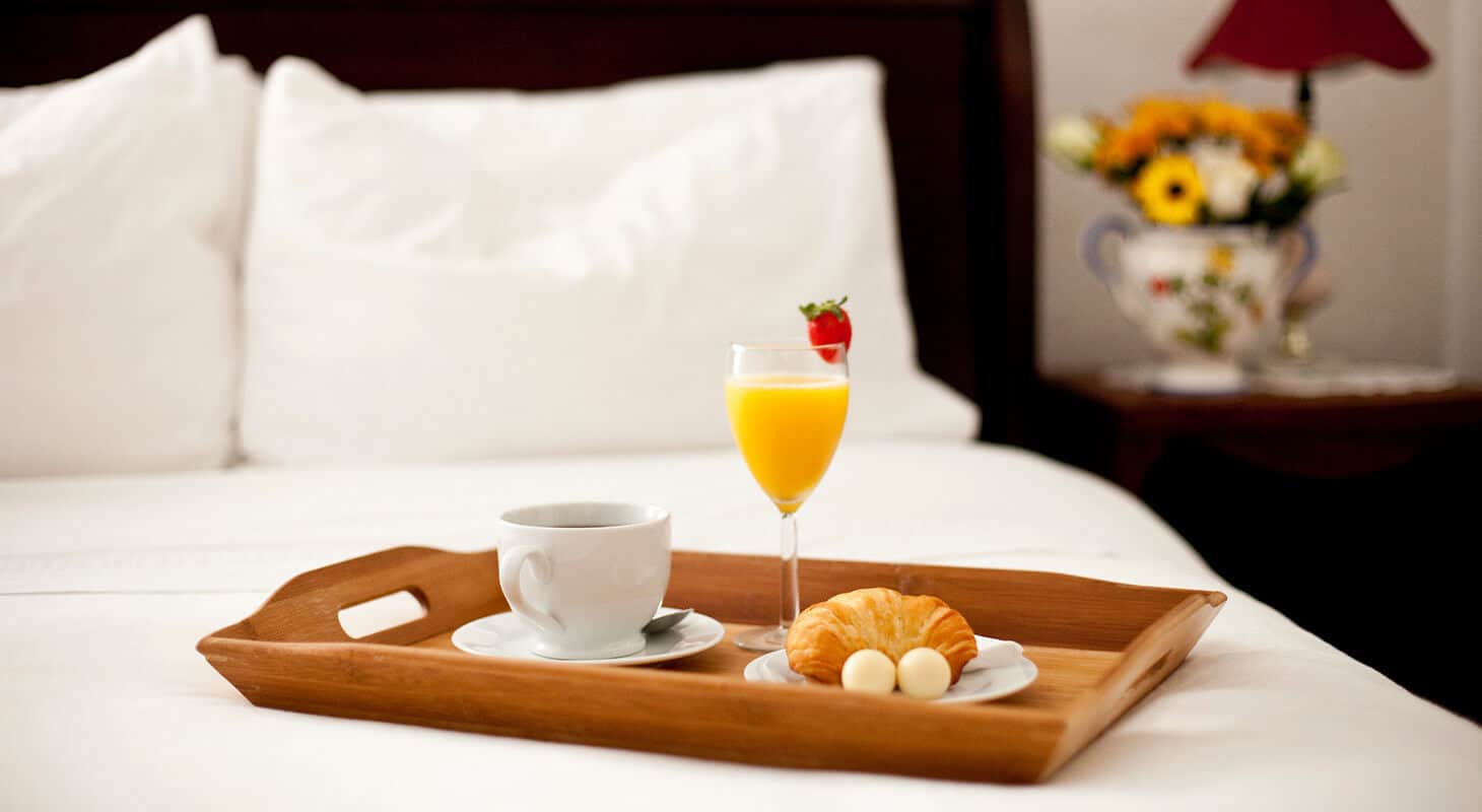 Breakfast Tray on Bed at American Guest House