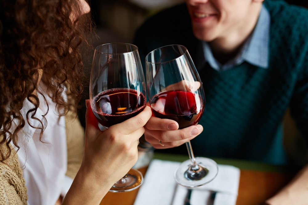 Dupont Circle Restaurants. photo of a couple enjoying a glass of red wine in Washington DC